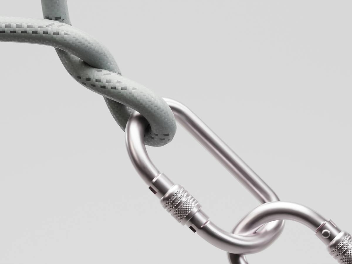 climber inspecting rope for climbing safety tips