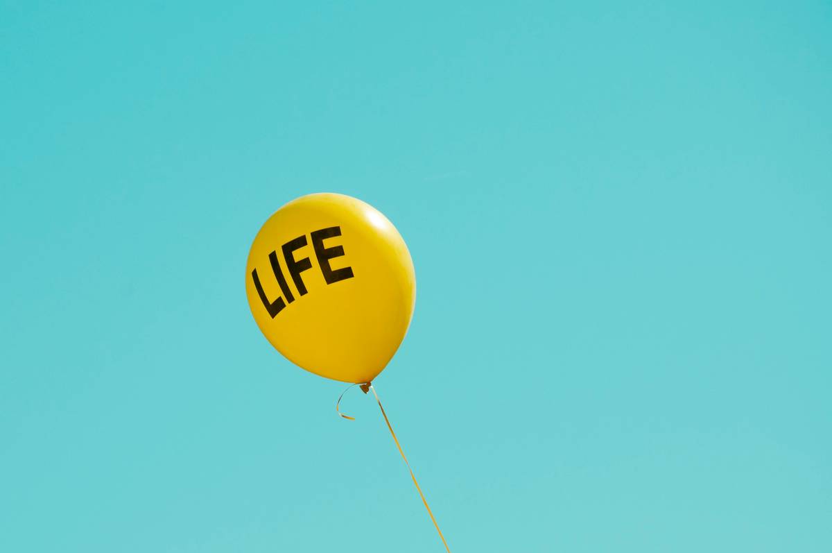 yellow life-printed balloon